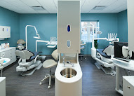 Doctor reviewing 3D scan and smile plan with patient