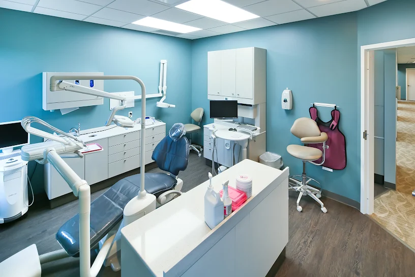 Clean corridor view into private surgical treatment rooms